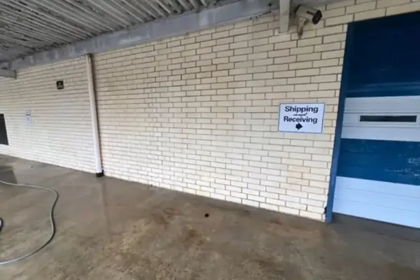The same wall at the college building in Clarkston after the building wash, with the streaks removed