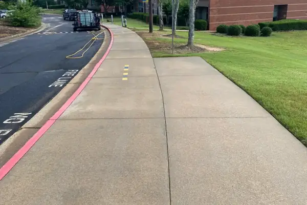 Campus sidewalk after hot-water pressure washing by Georgia Bubbles